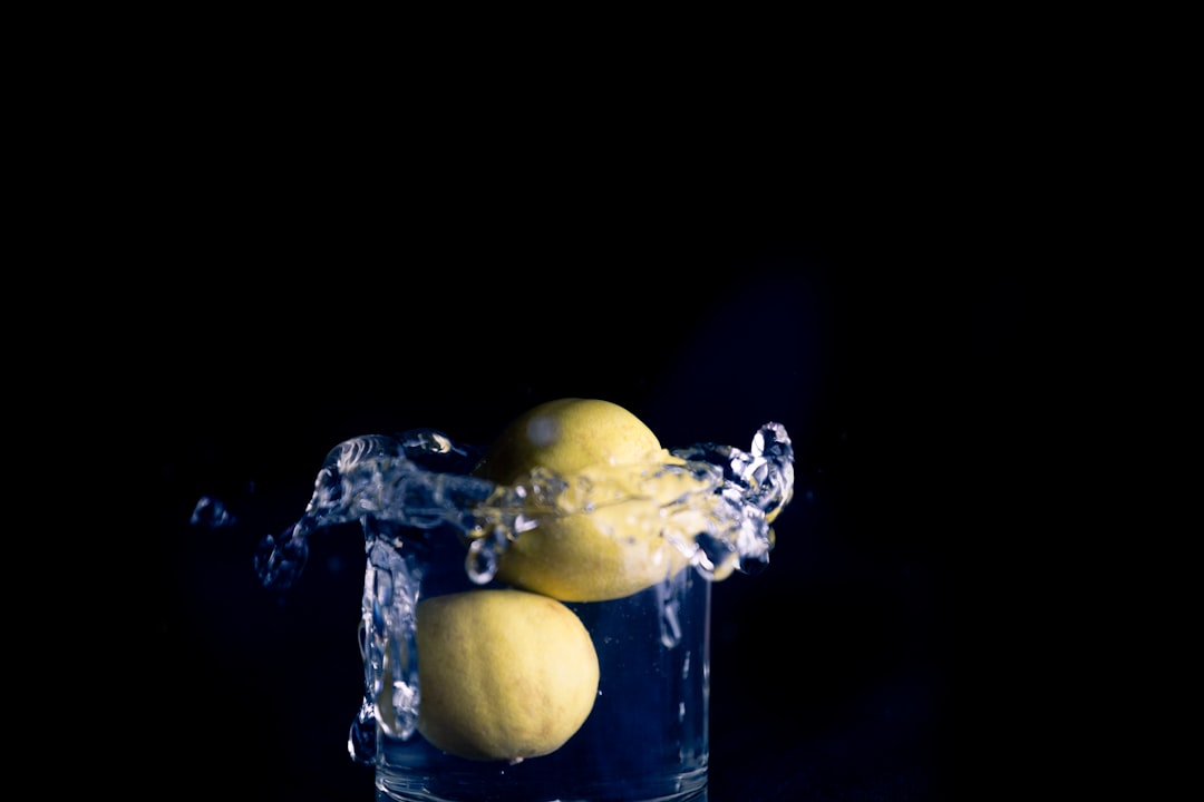 yellow fruit in clear glass container