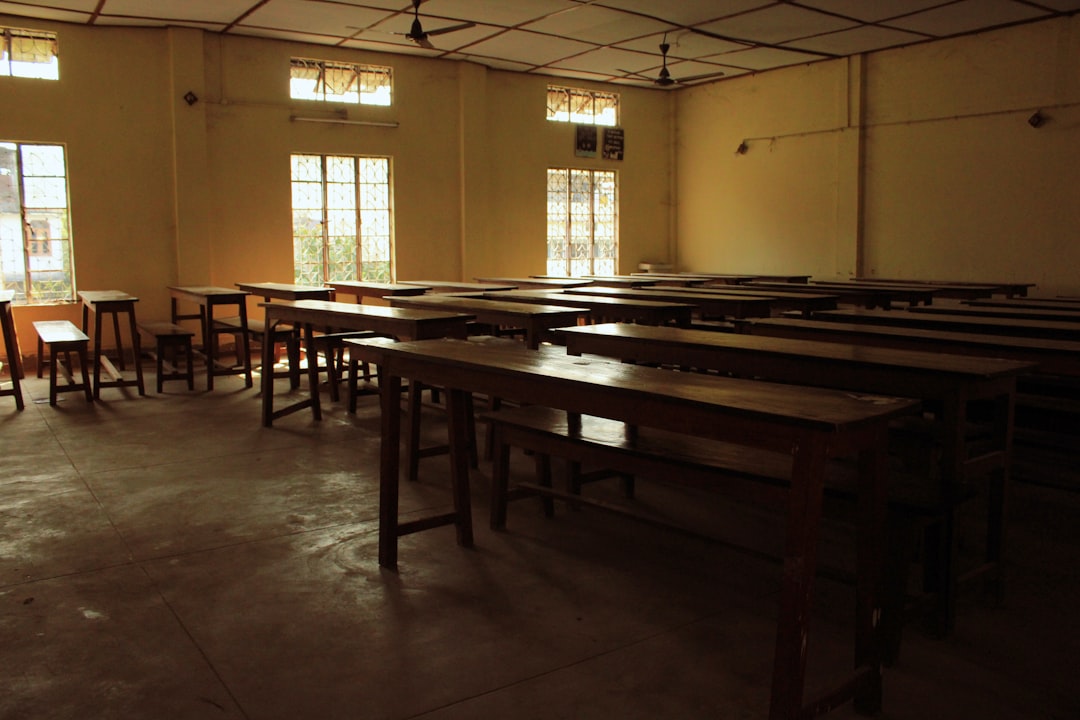 a room with tables and chairs in it